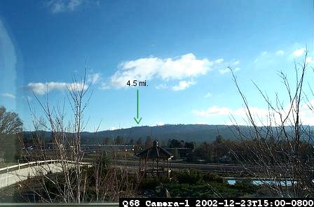 This is a camera-1 view of Pine Mountain Lake Airport, mid-day on a clear day.